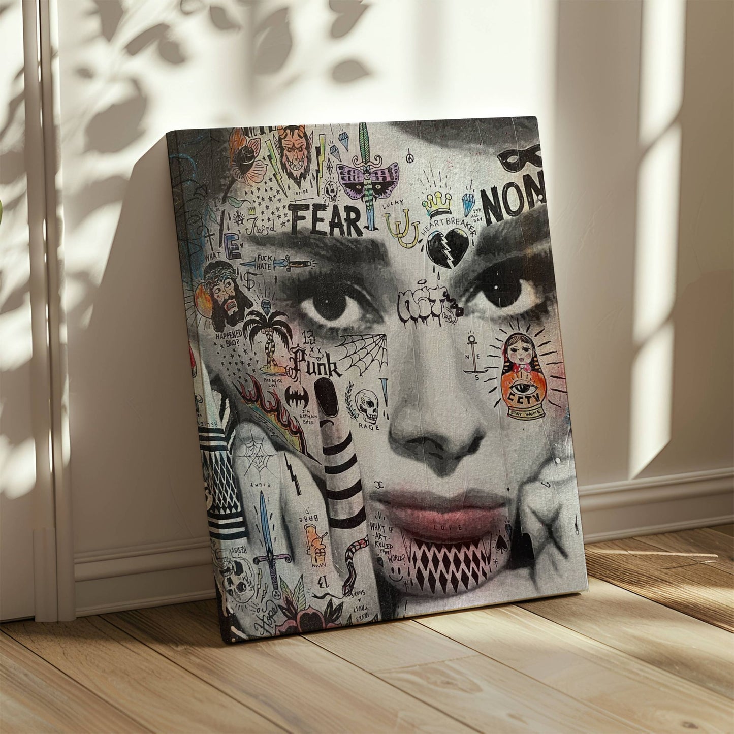 Illustrasjonen viser en paste up av "Audrey Hepburn" på lerret.