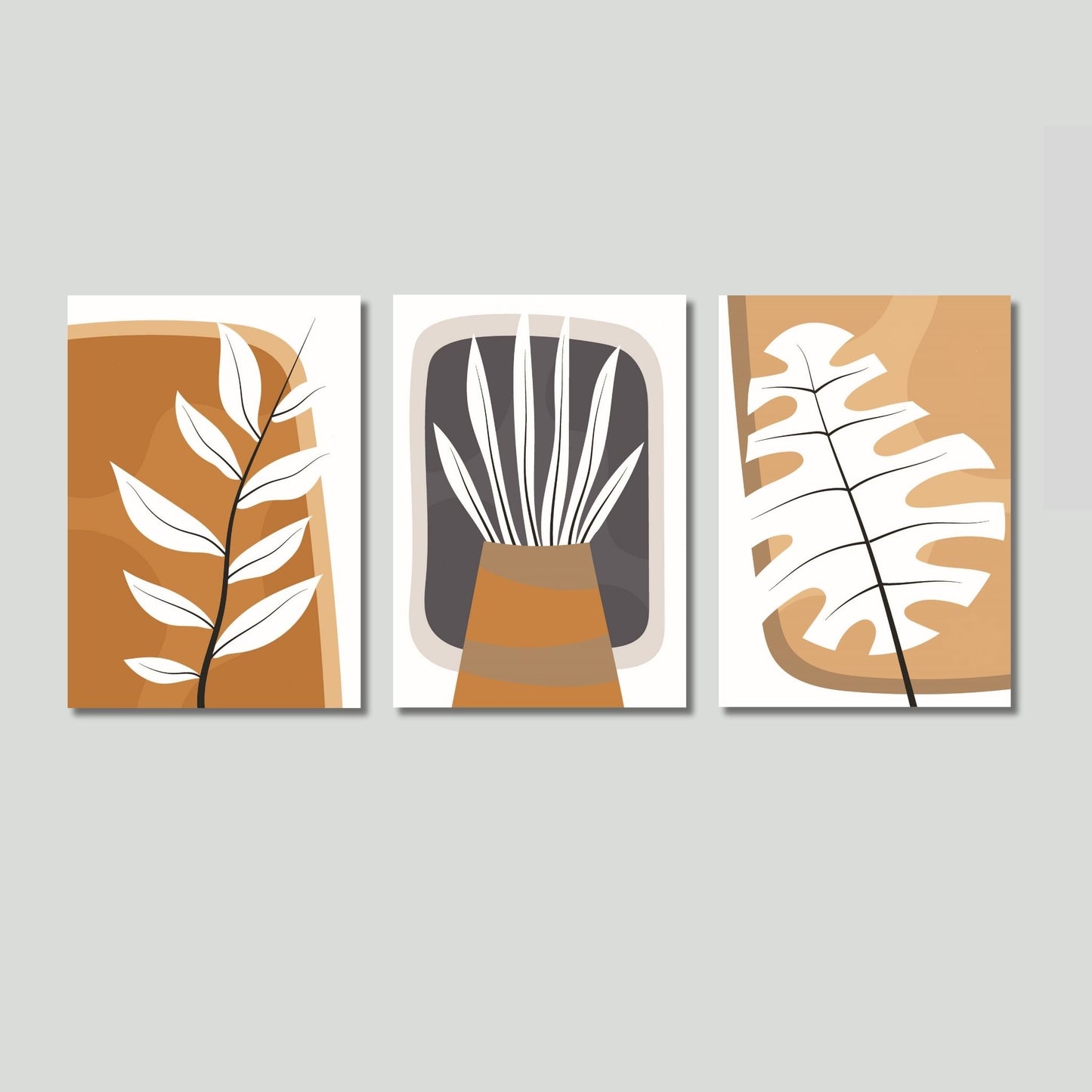 Oppdag skjønnheten i naturinspirert design med denne unike serien, Boho Wall Art. Denne tredelte plakat- og lerretsserien kombinerer stilrene botaniske motiver med nøytrale jordfarger som beige, hvitt, og oker. Illustrasjonsfoto viser motivene på lerret.
