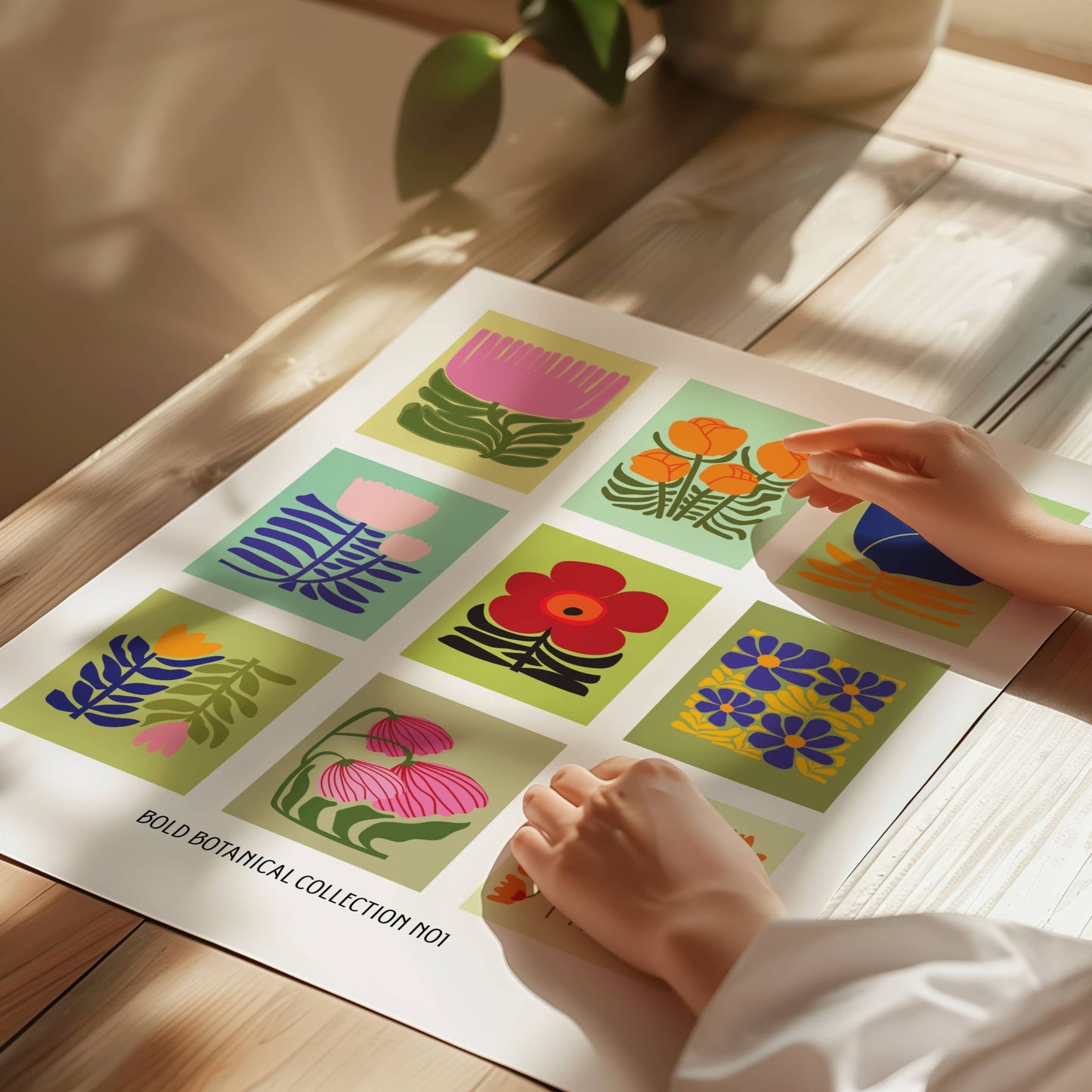 Bold Botanic-plakatene kombinerer stiliserte blomster med grafisk lekenhet, inspirert av retro paletter og moderne flat design. Illustrasjon viser Bold Botanic No1 på print.