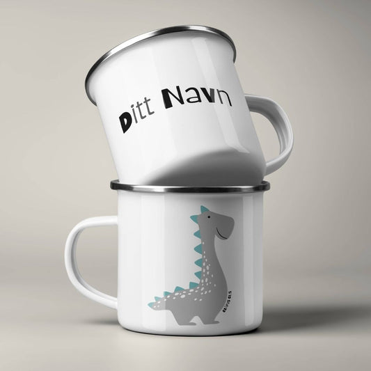 Emaljekrus stablet, med personlig navn på ene siden og dinosaurmotiv på andre siden