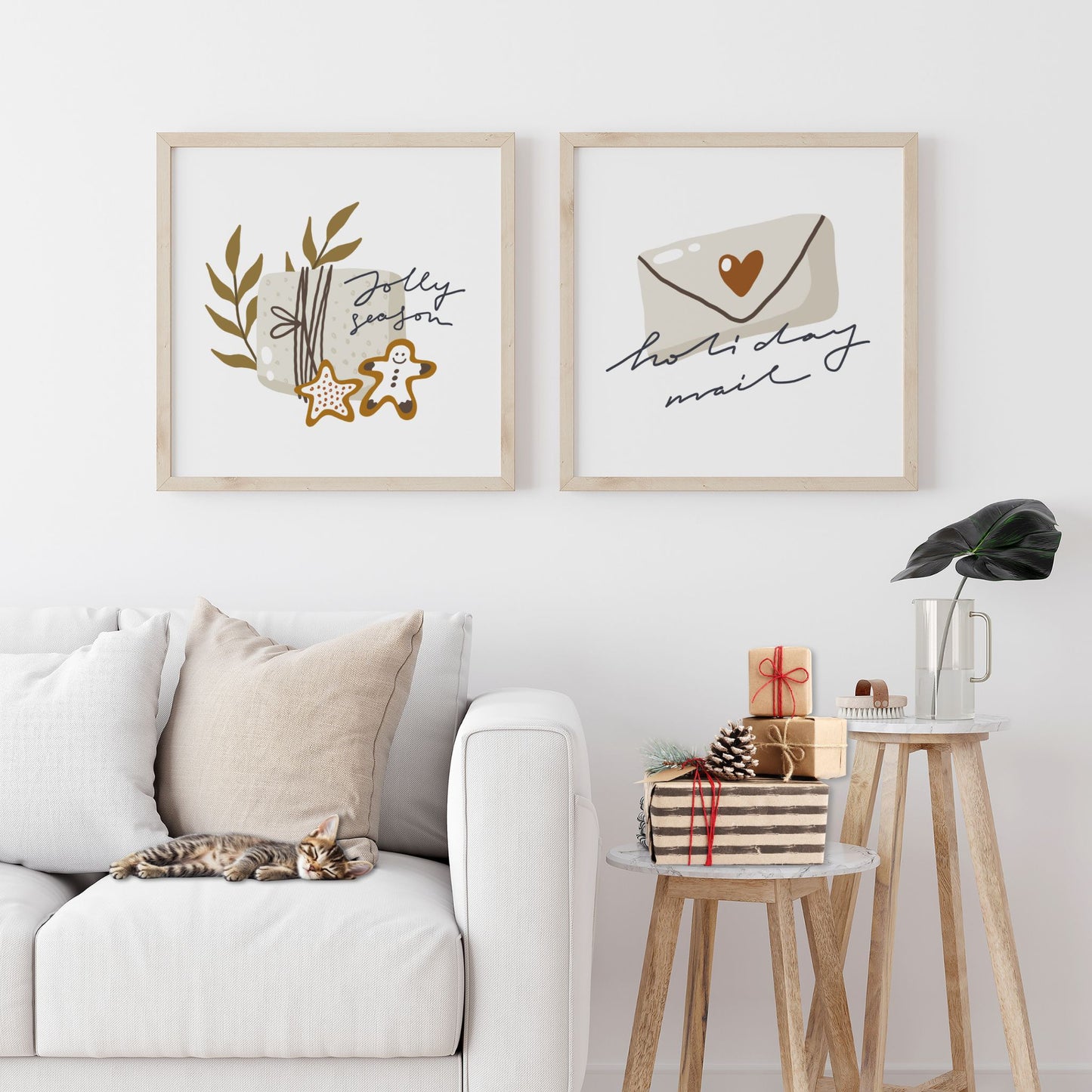 Et søtt og minimalistisk motiv med teksten Holiday Mail, der en liten konvolutt med hjerte symboliserer varme julehilsener. Illustrasjon viser plakat i eik ramme ved siden av seriens plakat Jolly Season Cookies.