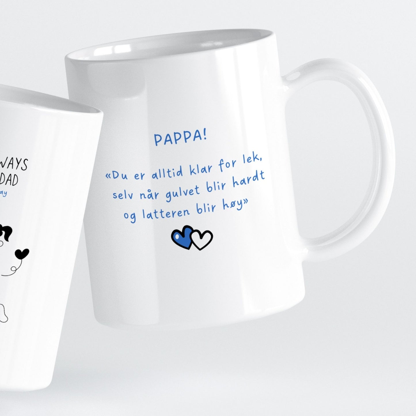 Et varmt og humoristisk krus som fanger gleden mellom far og barn.
Motivet viser lek og samhold – et symbol på kjærligheten som vokser gjennom små øyeblikk.