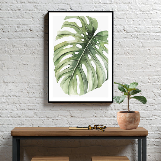 Forny hjemmet ditt med et snev av naturens skjønnhet med vår grafiske akvarell "Monstera Leaf" plakat og lerret. Illustrasjonsfoto viser motivet som plakat i svart ramme.