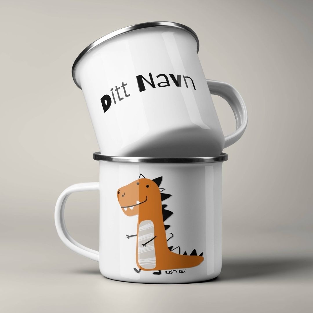 Emaljekrus stablet, med personlig navn på ene siden og dinosaurmotiv på andre siden
