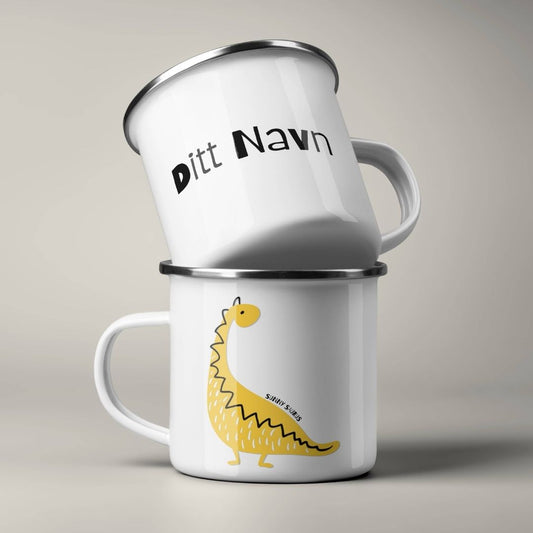 Emaljekrus stablet, med personlig navn på ene siden og dinosaurmotiv på andre siden