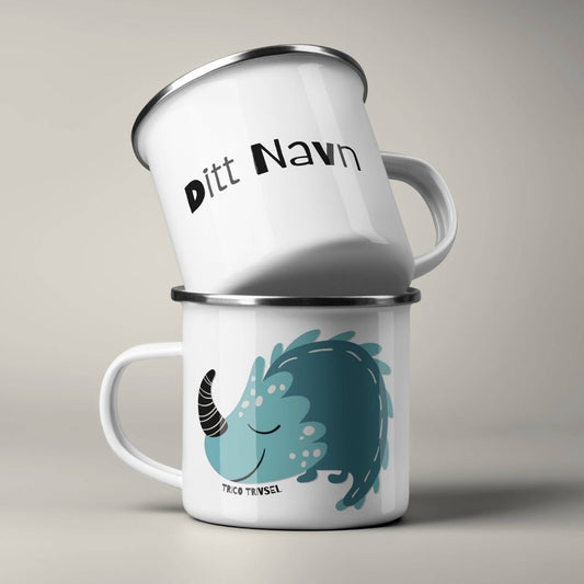 Emaljekrus stablet, med personlig navn på ene siden og dinosaurmotiv på andre siden