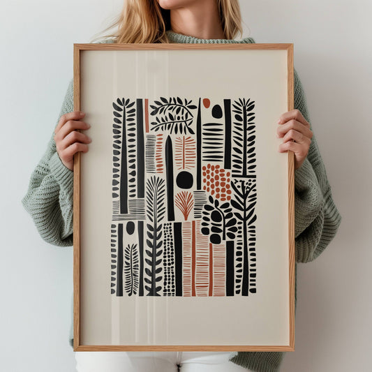 Urban Jungle er en leken og stilig plakat med grafiske planteelementer i svarte og oransje toner. Illustrasjon viser motiv med bred kant i eik ramme.