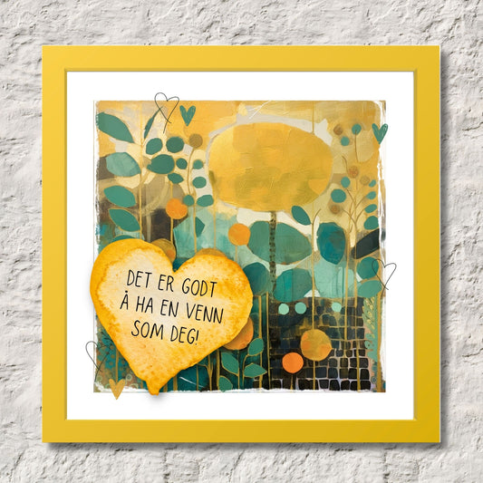 Plakat med lysegult hjerte og tekst "Det er godt å ha en venn som deg" - og et motiv med farger i grønn, gul og oransje. Med hvit kant på 1,5 cm. Illustrasjon viser plakat i gul ramme.