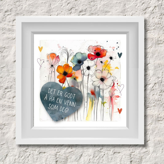 Plakat med lysegult hjerte og tekst "Det er godt å ha en venn som deg" - og et motiv med blomster i gul, rød, hvit, blå og oransje. Med hvit kant på 1,5 cm. Illustrasjon viser plakat i hvit ramme.