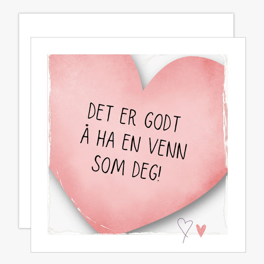 Kort med rosa hjerte med tekst "Det er godt å ha en venn som deg". Konvolutt er inkludert.