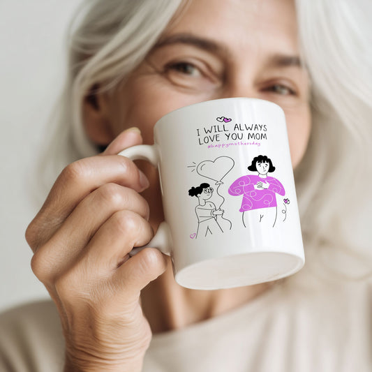 Kvinne holder keramikkrus med illustrasjon og teksten “I will always love you mom”