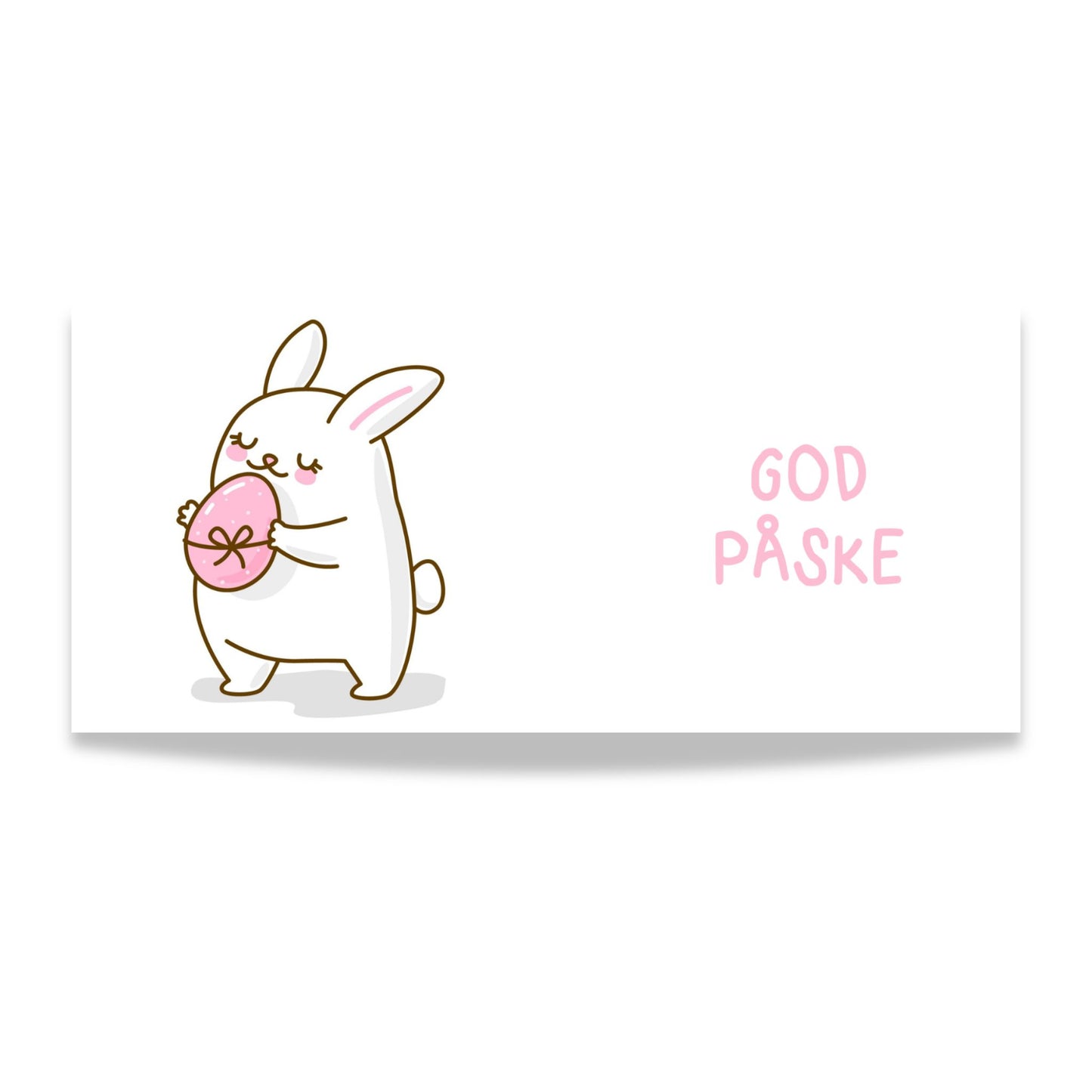 Hvitt keramikkrus med søt påskehare som holder rosa påskeegg og teksten God påske i rosatone på motsatt side. Illustrasjon av design.