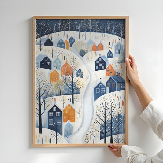 Vinterstien plakat med moderne vinterlandskap, blå og okergule hus og grafiske vintertrær. Illustrasjon viser plaktat uten hvit kantlinje i eik ramme.