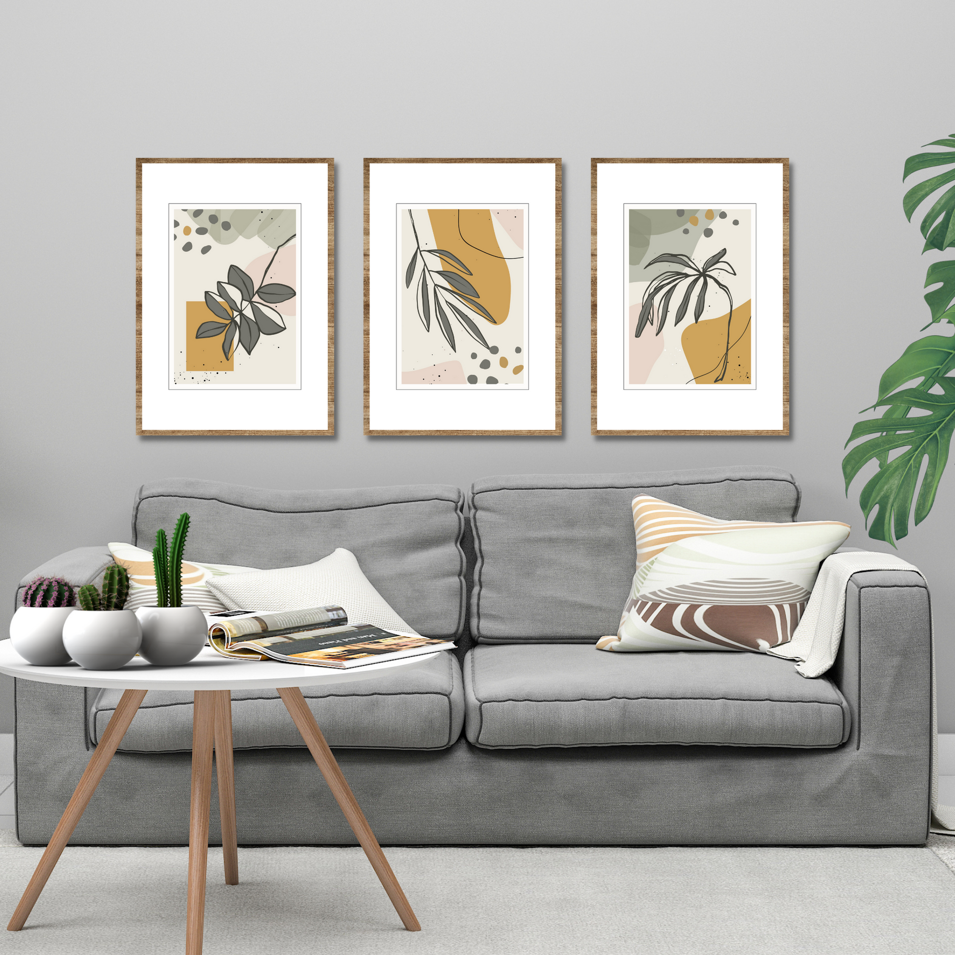 Serie med tre abstrakte grafiske motiver med tropiske blader i fargenyanser sort, oker, rosa, grå og beige. Plakaten har hvit kantlinje. For innramming eller på lerret.