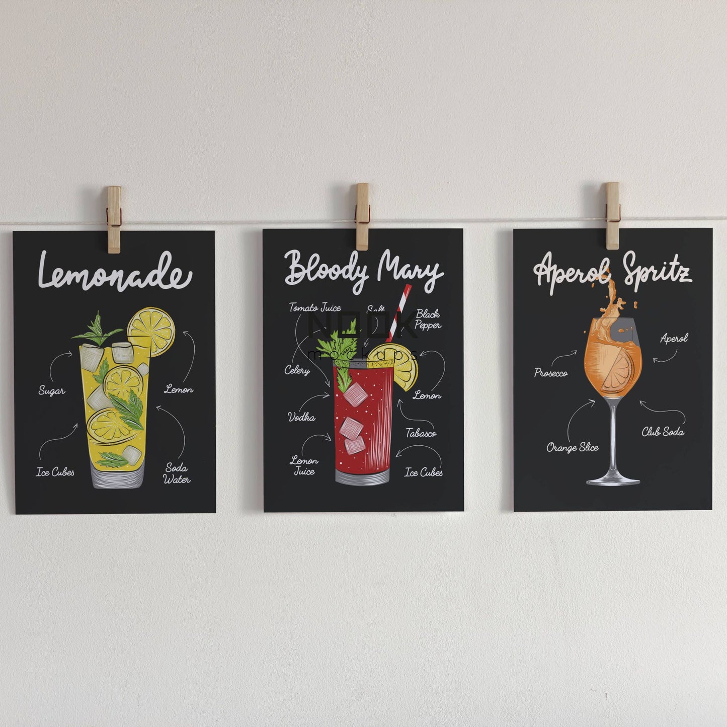 Illustrasjon som viser Lemonade, Bloody Mary og Aperol Spritz Cocktailplakater på mørk bakgrunn som er festet med klyper på en snor.