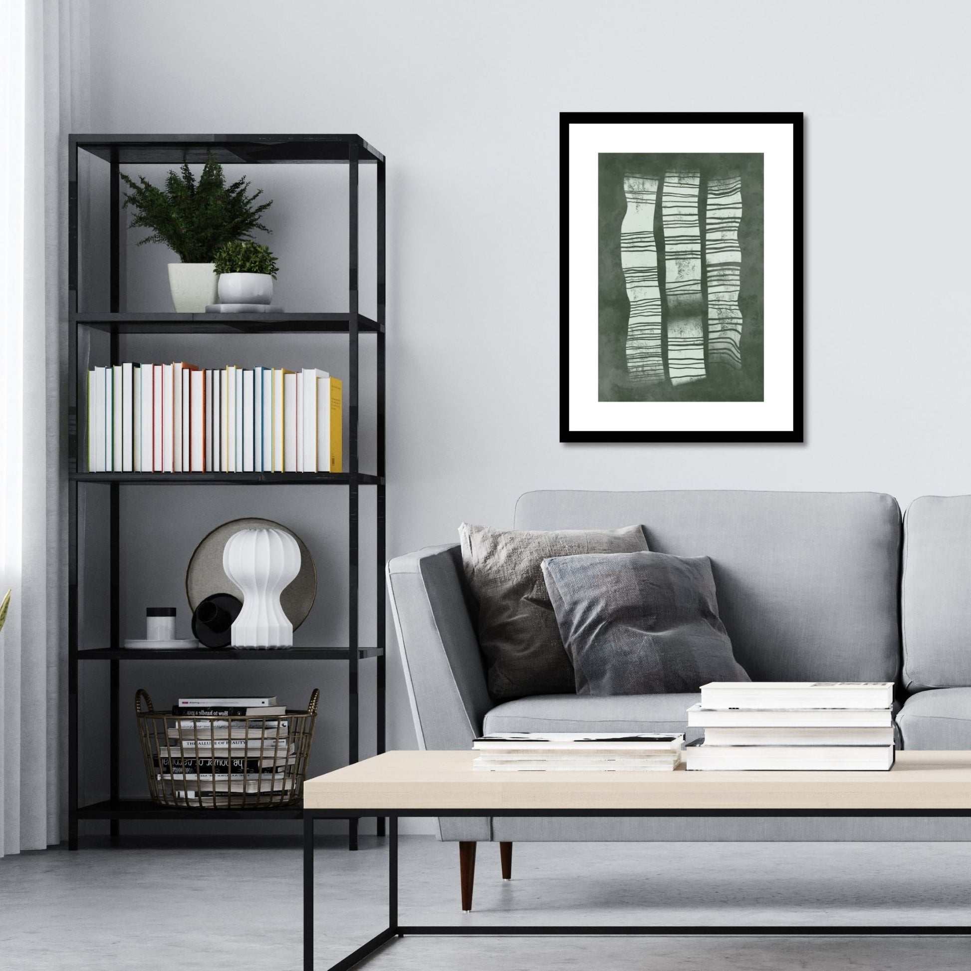 Green Abstract plakat. Med sine beroligende grønne toner og sofistikerte design, tilfører denne plakaten en følelse av ro og harmoni til ethvert rom. Illustrasjonen viser plakat i sort ramme på en vegg over en sofa.