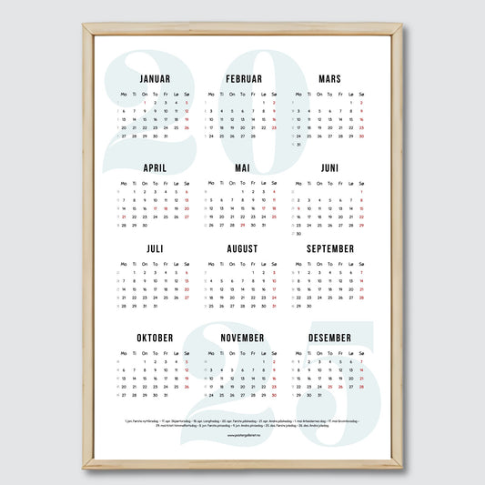 Planlegg året med stil med Kalender 2025! Kalenderen er både funksjonell og dekorativ, og passer perfekt på veggen. Ilustrasjonsfoto viser kalender i lys ramme.