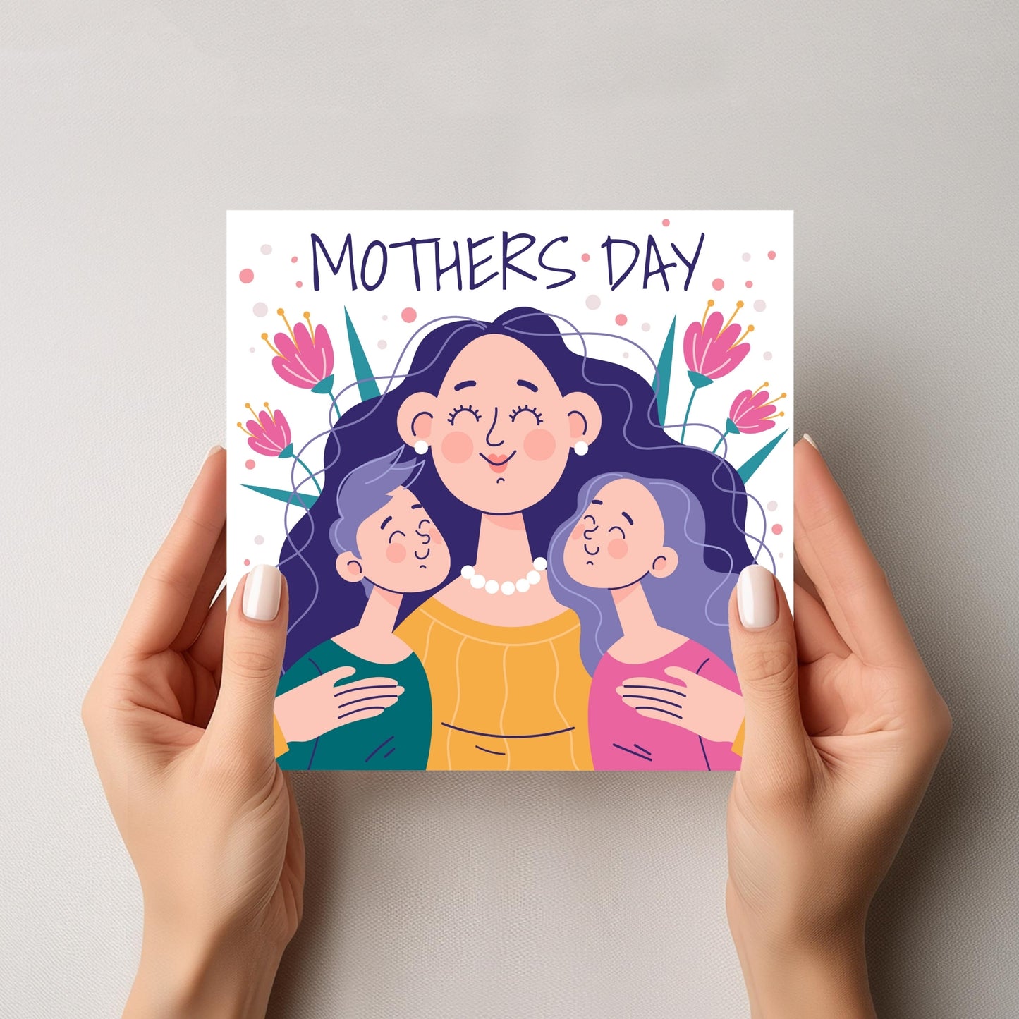Motivet viser en mor som omfavner sine barn, omgitt av blomster og teksten "Mother's Day". 