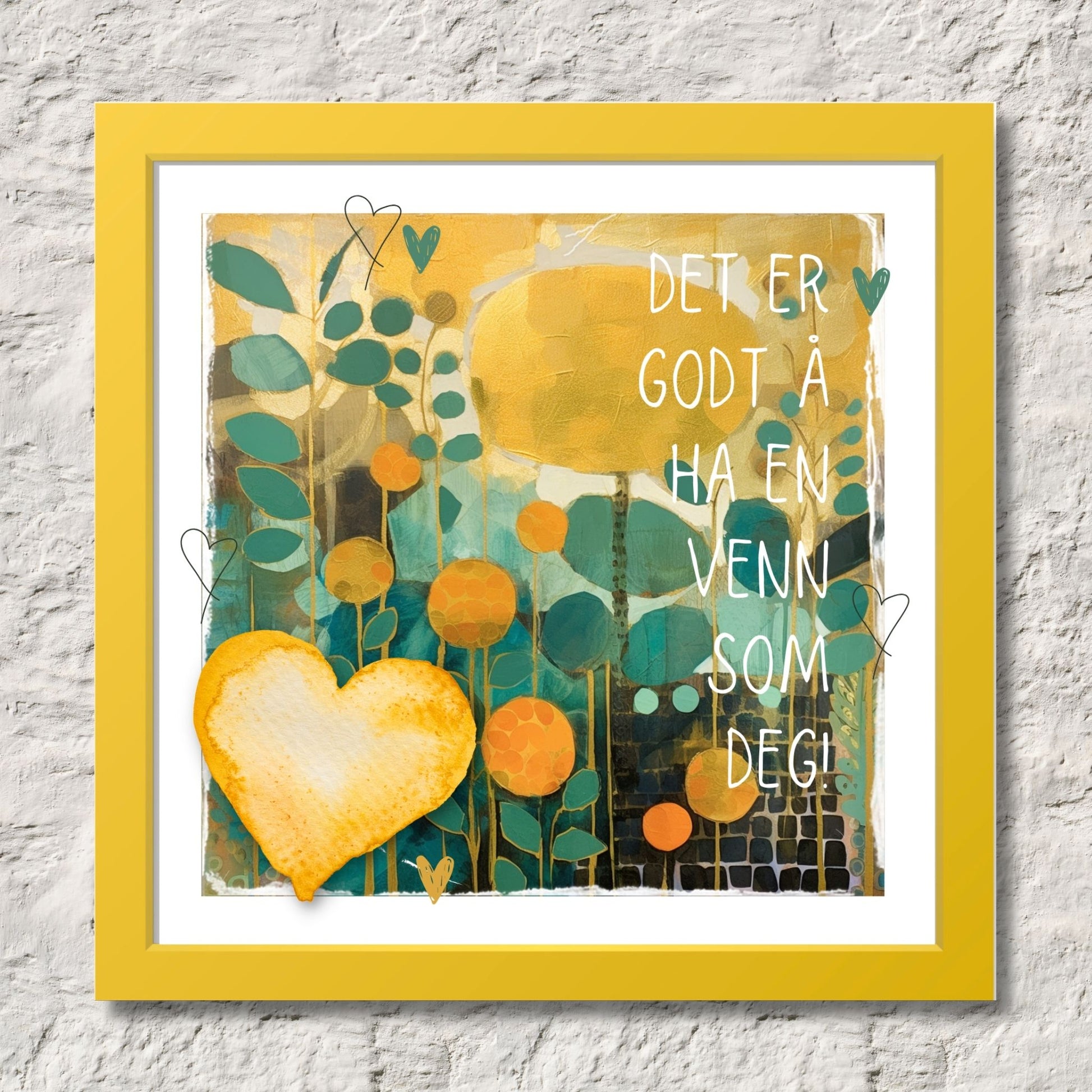 Plakat med lysegult hjerte og tekst "Det er godt å ha en venn som deg" - og et motiv med farger i grønn, gul og oransje. Med hvit kant på 1,5 cm. Illustrasjon viser plakat i gul ramme.