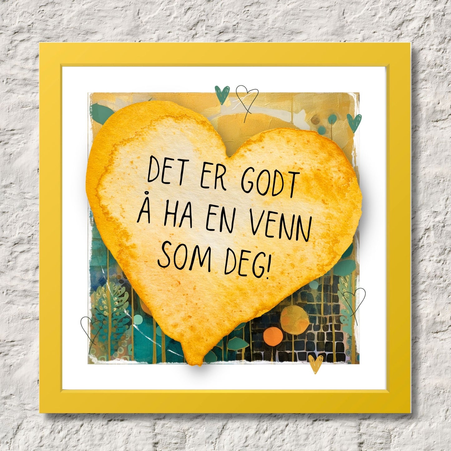 Plakat med lysegult hjerte og tekst "Det er godt å ha en venn som deg" - og et motiv med farger i grønn, gul og oransje. Med hvit kant på 1,5 cm. Illustrasjon viser plakat i gul ramme.