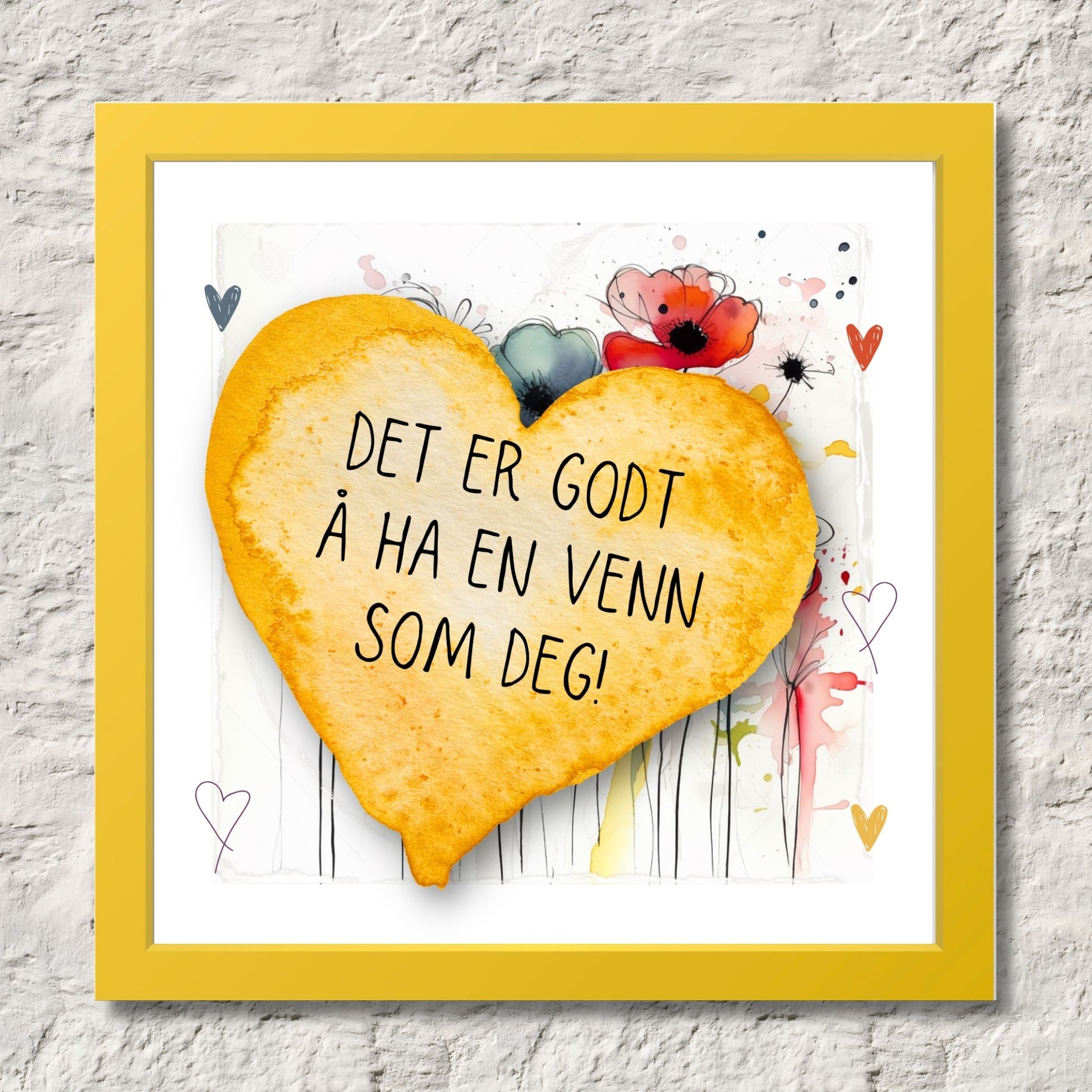 Plakat med lysegult hjerte og tekst "Det er godt å ha en venn som deg" - og et motiv med blomster i gul, rød, hvit, blå og oransje. Med hvit kant på 1,5 cm. Illustrasjon viser plakat i gul ramme.
