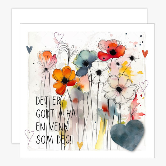 Kort med blått hjerte og bakgrunn med fargerik blomstereng, og tekst "Det er godt å ha en venn som deg".  Konvolutt er inkludert.