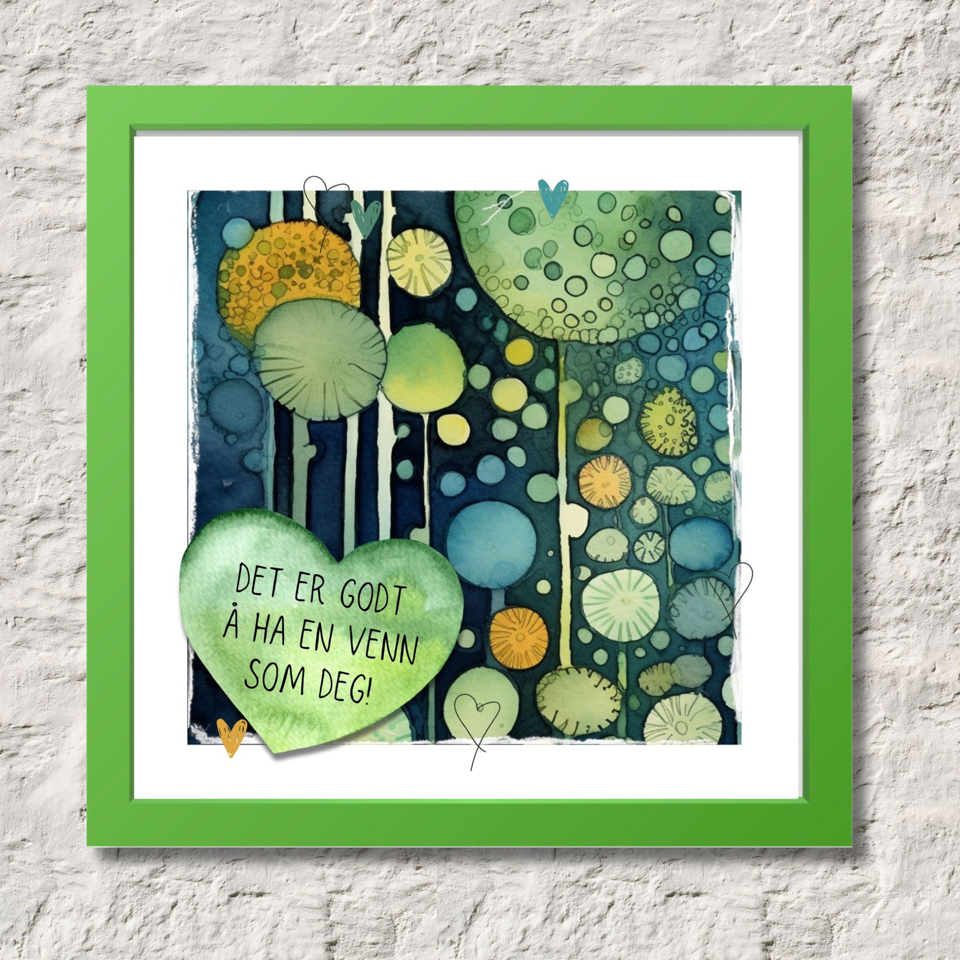 Plakat med tekst "Det er godt å ha en venn som deg" - og et motiv med farger i grønn, blått og oransje. Med hvit kant på 1,5 cm. Illustrasjon viser plakat i grønn ramme.