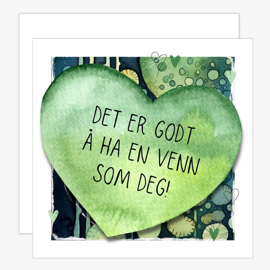 Kort med et grønt hjerte med tekst "Det er godt å ha en venn som deg" - og et motiv med farger i grønn, blått og oransje.  Konvolutt er inkludert.