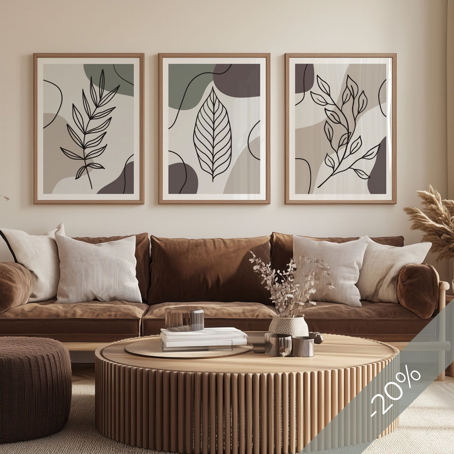 Botanical Lines Trio med tre botaniske plakater over sofa i varme naturtoner