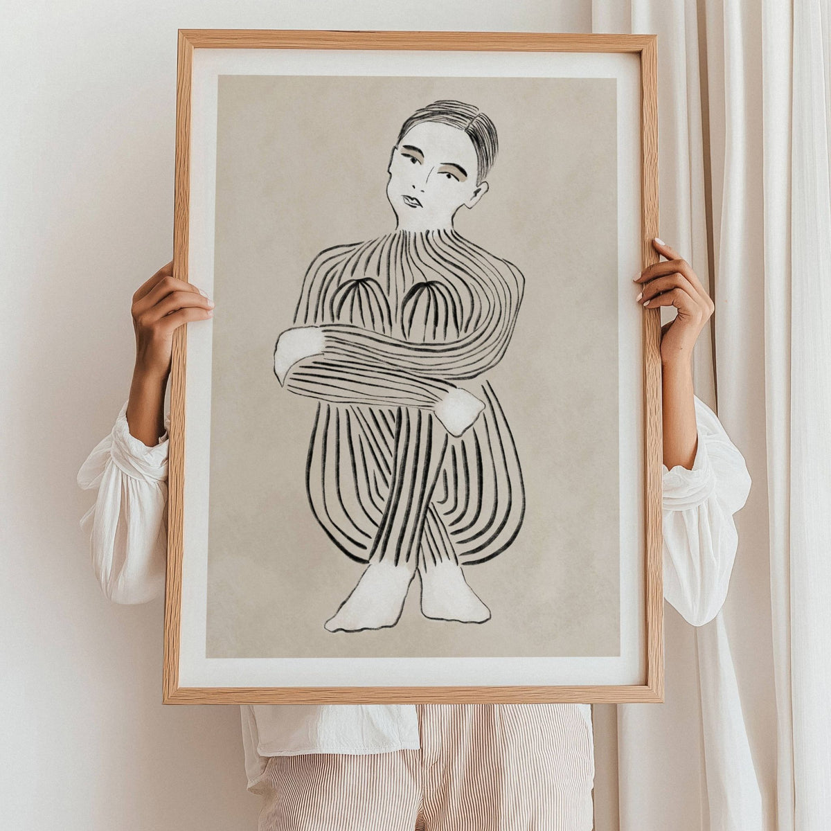 Embrace kunstplakat i eikeramme vist i stort format