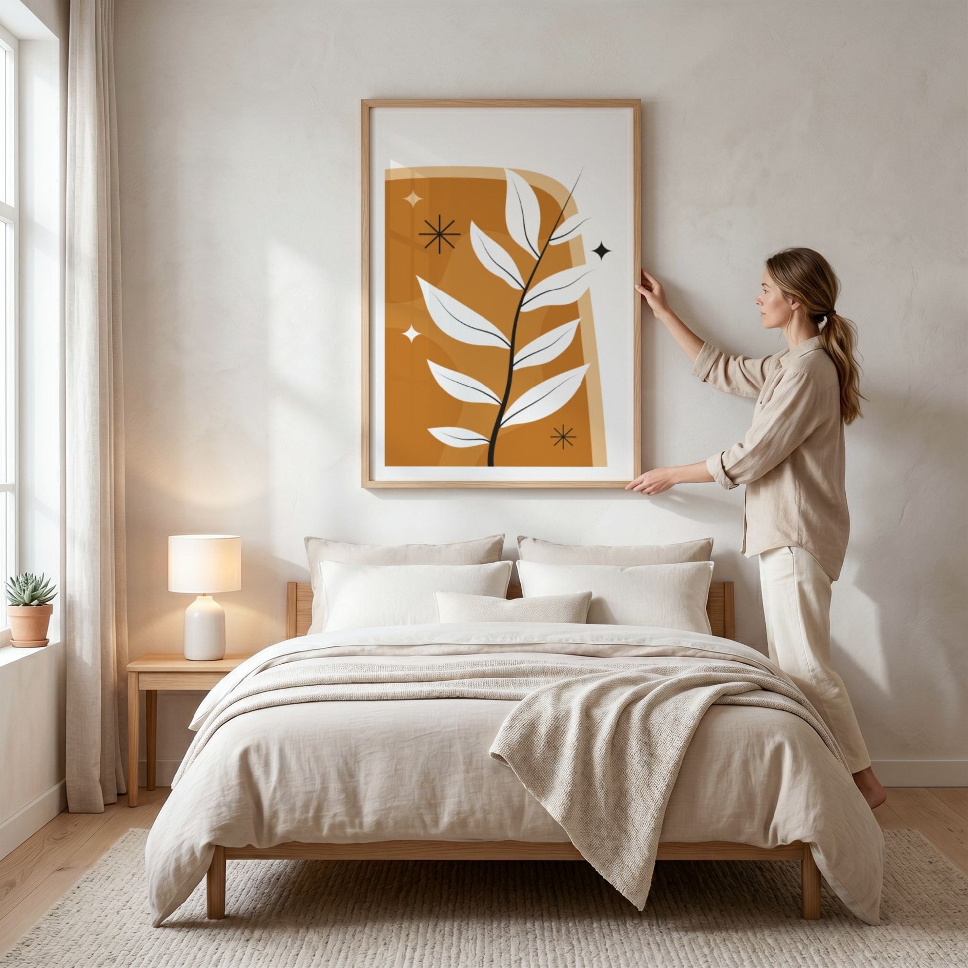 Golden Branch Boho Wall Art-plakat i eikeramme over seng i lyst soverom