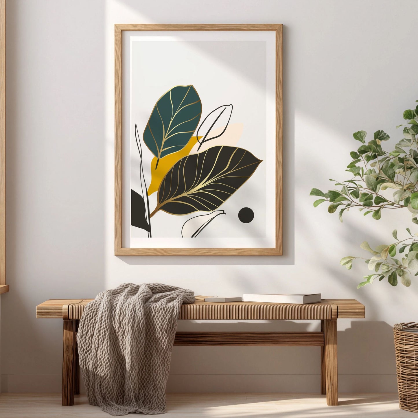 Golden Leaves grafisk botanisk plakat i eikeramme over trebenk i lyst interiør