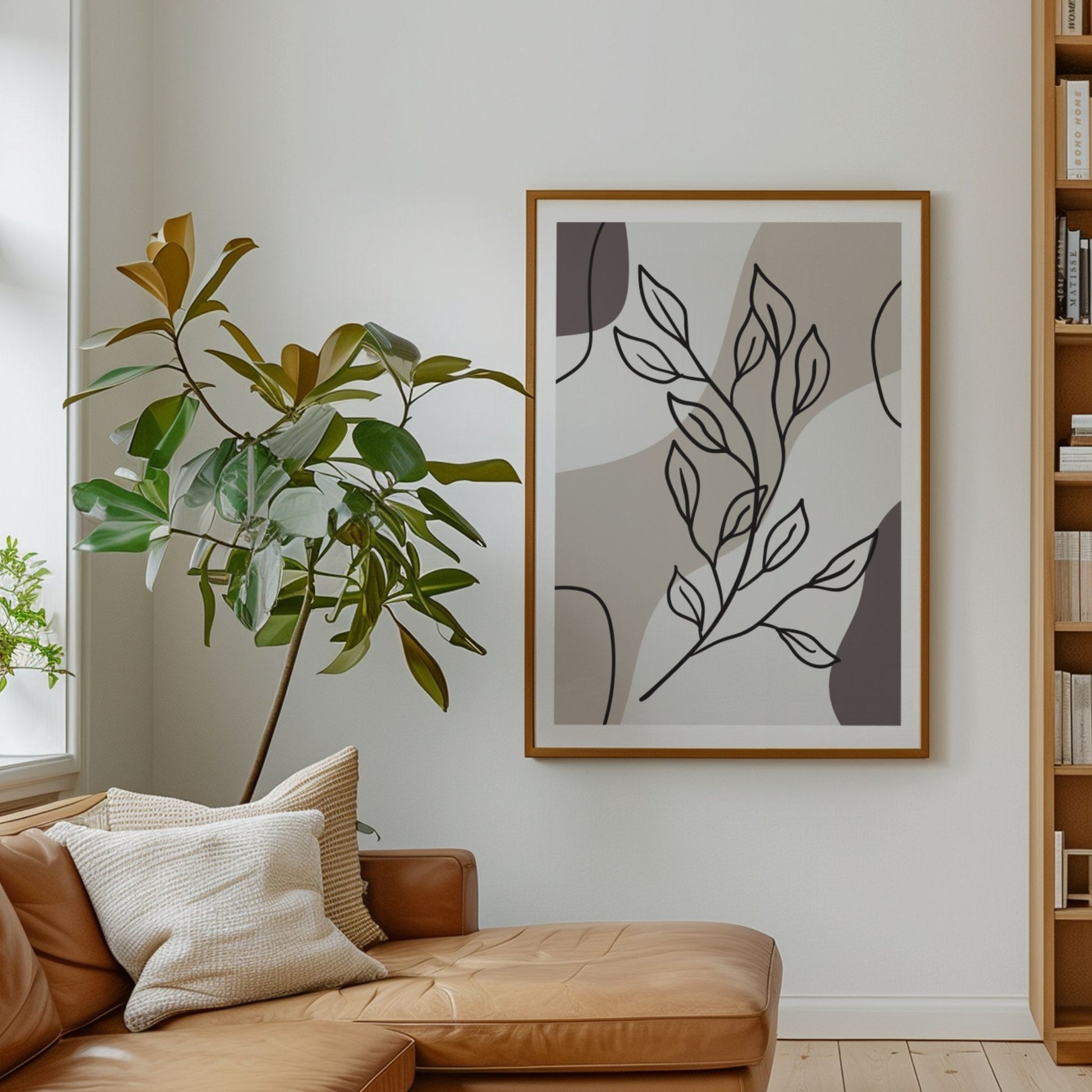 Growing Branch botanisk plakat i treramme ved brun skinnsofa og grønne planter