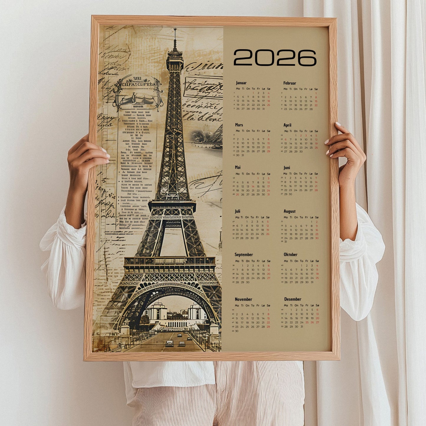 Kalender 2026 med vintage-motiv av Eiffeltårnet og retro bakgrunn. Illustrasjon viser kalender i eik ramme.