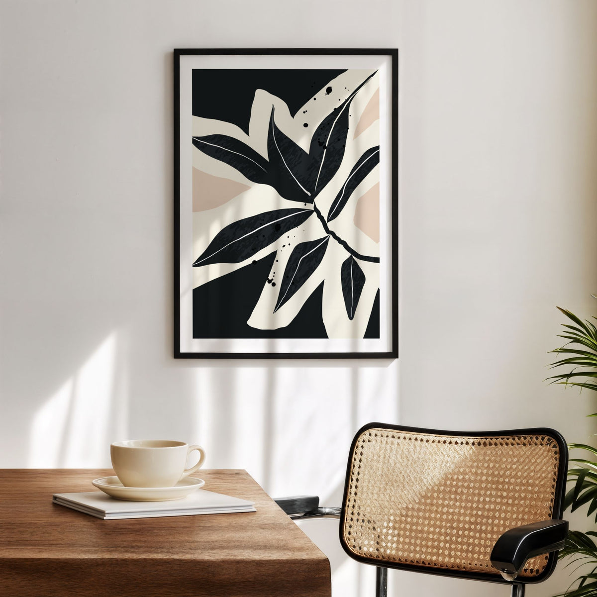 Monochrome Botanica No1 grafisk plakat med sort ramme ved spiseplass