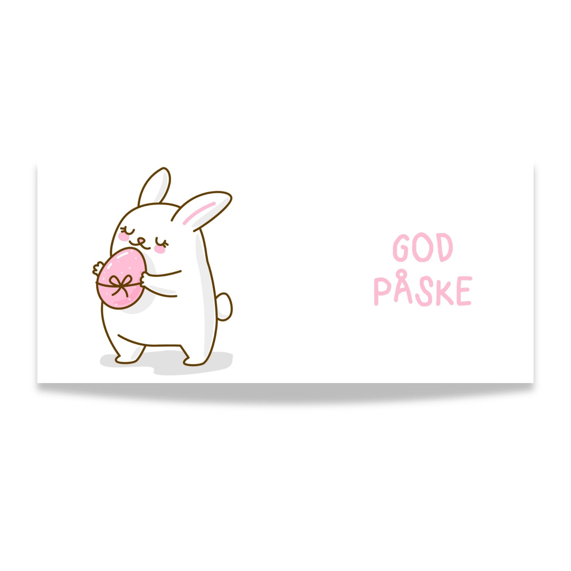 Hvitt keramikkrus med søt påskehare som holder rosa påskeegg og teksten God påske i rosatone på motsatt side. Illustrasjon av design.