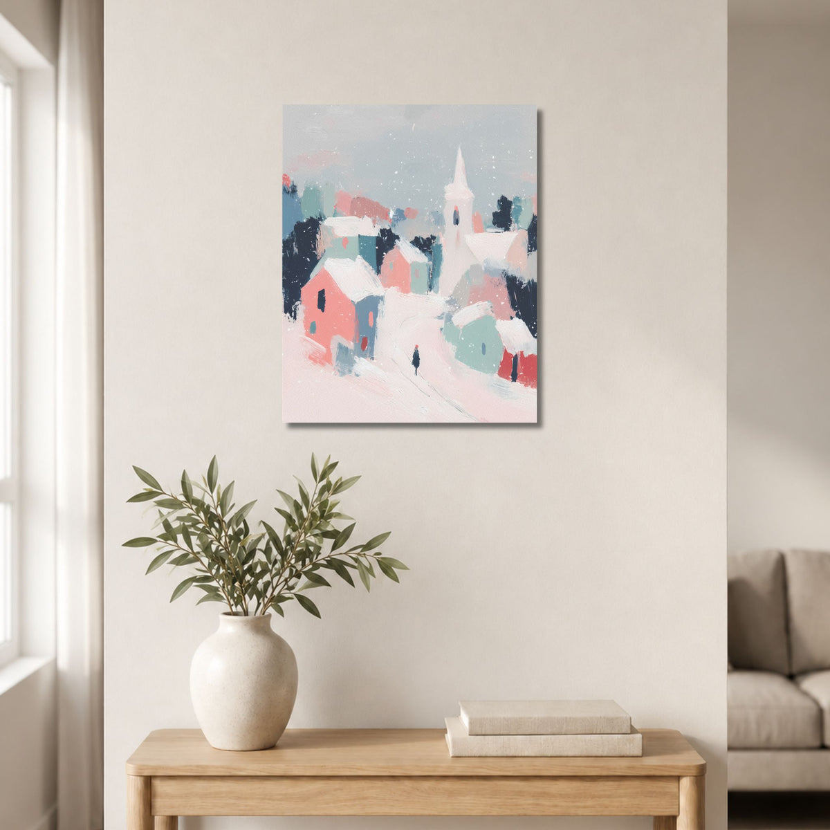 Pastel Winter Village lerret på lys vegg over et trebord med vase