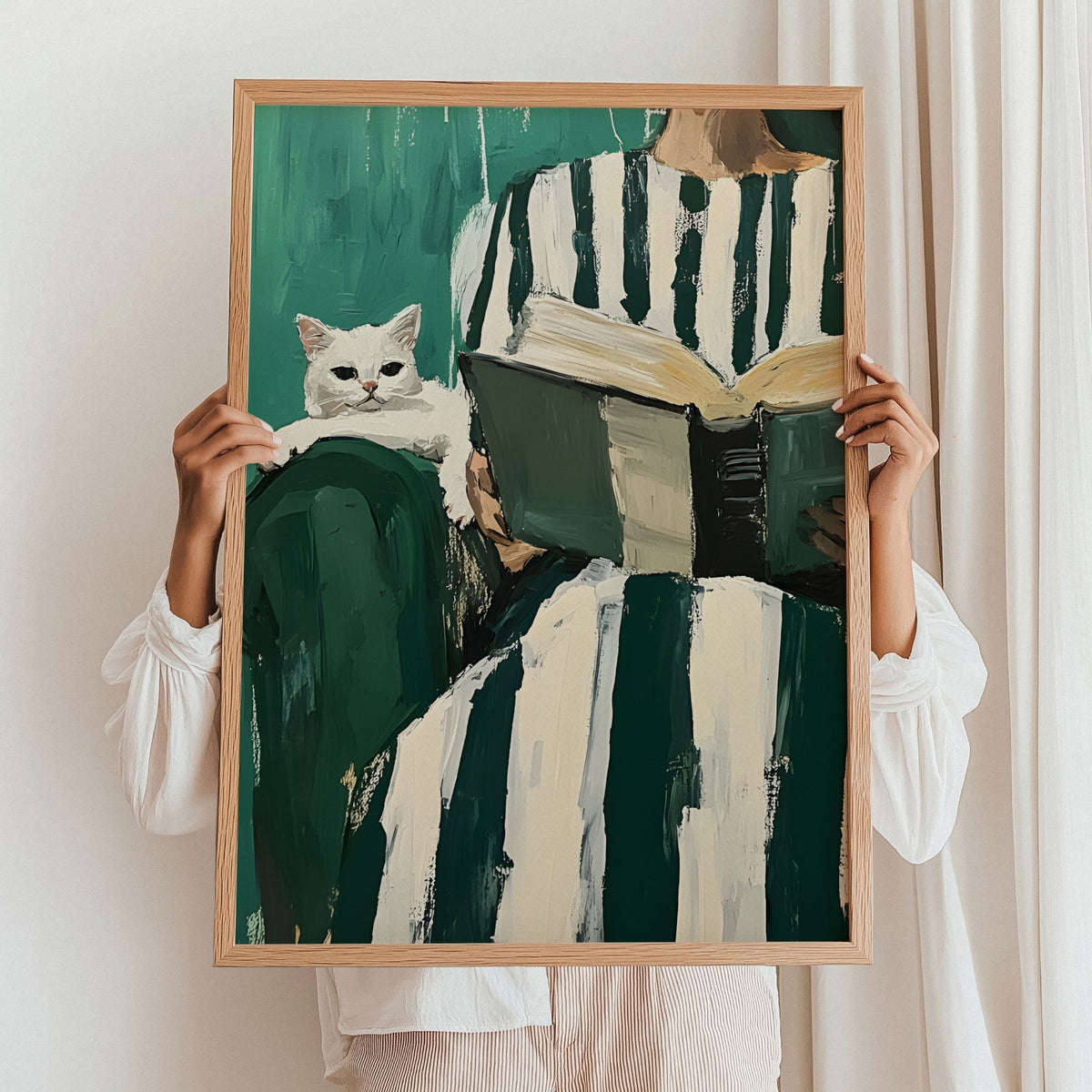 Reading Companion kunstplakat holdt opp i eikeramme som inspirasjon til innramming