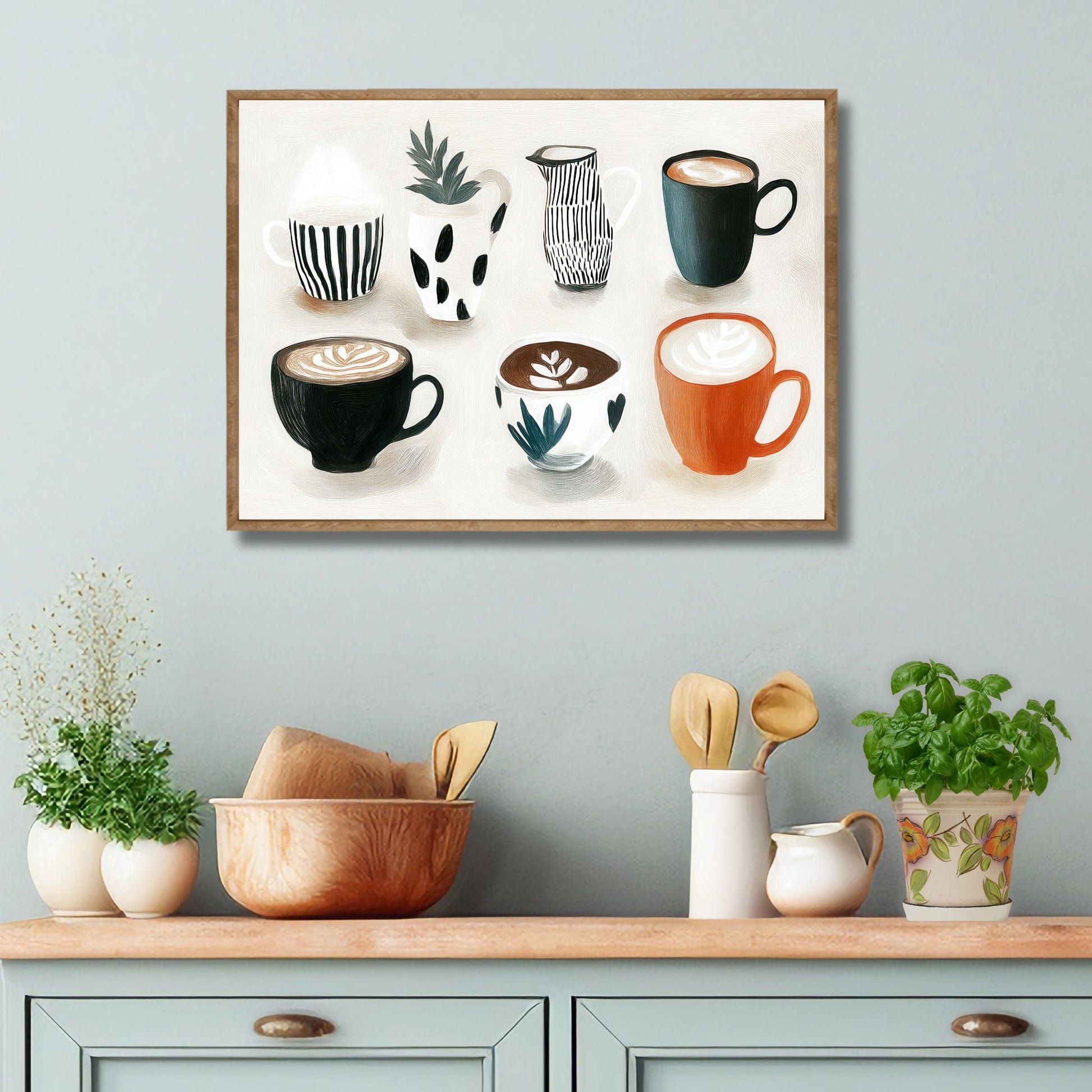 Stilren plakat med kaffekopper og keramikk i varme jordtoner og rolig uttrykk fra serien Still Life & Everyday Calm. Miljøbilde av plakat i eik ramme på kjøkken.