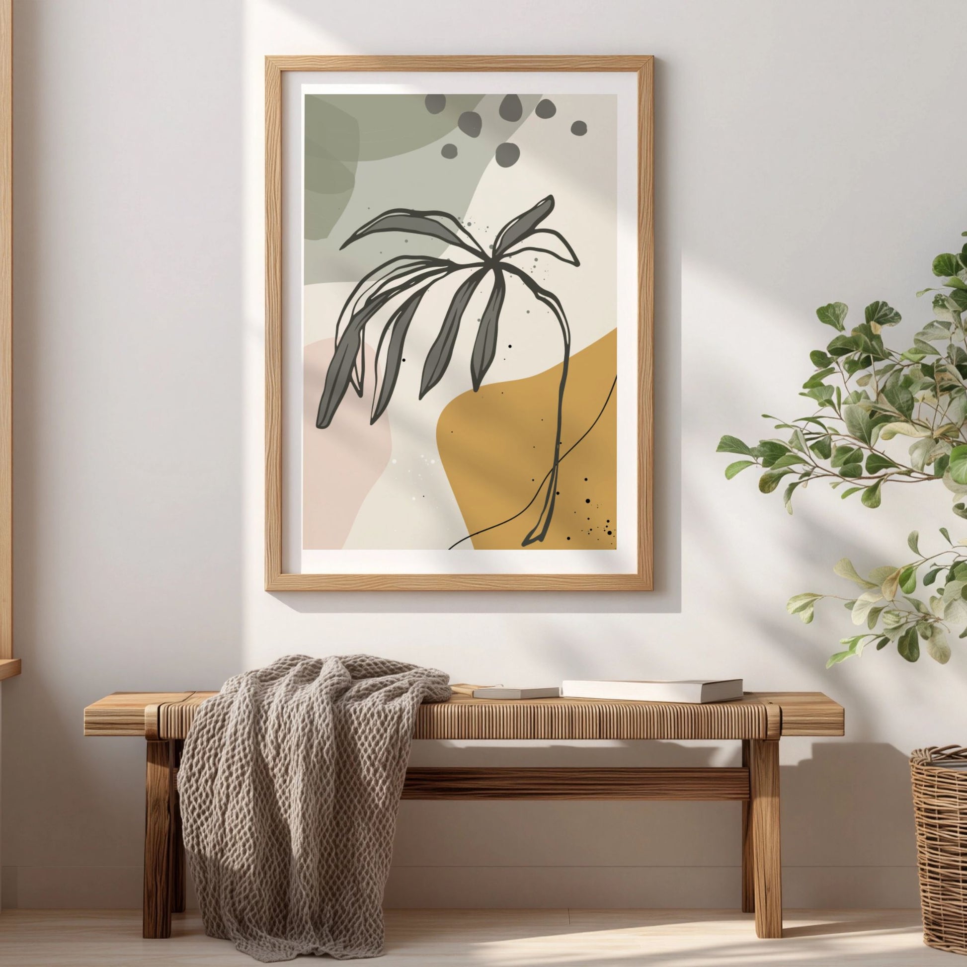 Wild Branch botanisk plakat i eikeramme over trebenk i lyst interiør